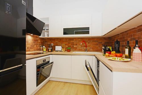 Η κουζίνα ή μικρή κουζίνα στο XY Suites - Design Apartments