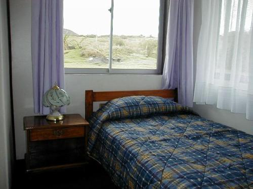 Katil atau katil-katil dalam bilik di Cabañas Krava Inn