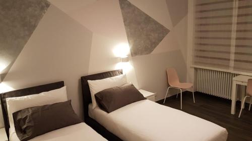 Postel nebo postele na pokoji v ubytování B&B Xenia