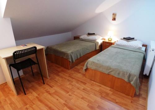 Postel nebo postele na pokoji v ubytování Kuc kuc apartmani