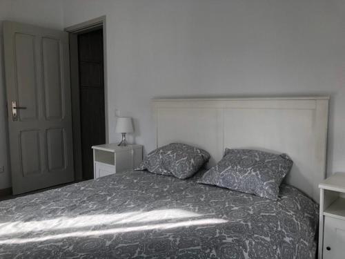 Posteľ alebo postele v izbe v ubytovaní Chainha's Dream Apartment