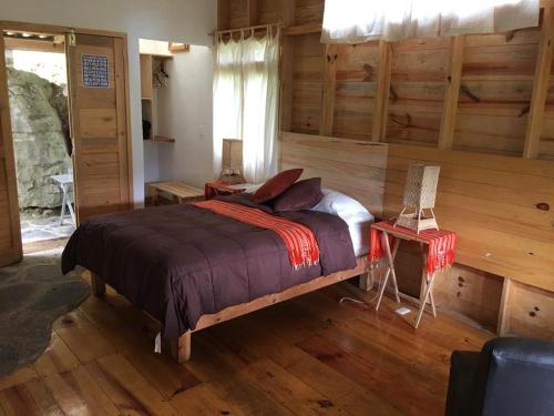 Una cama o camas en una habitación de Reserva Azul