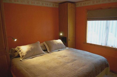 Un ou plusieurs lits dans un hébergement de l'établissement Apart Hotel Claro de Luna