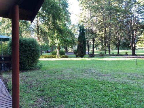 Сад в Cabañas Jardin Secreto
