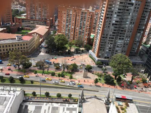 an aerial view of a city street with traffic at Enjoy In Bogotá in Bogotá