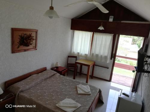 Postel nebo postele na pokoji v ubytování Hotel Yeruti