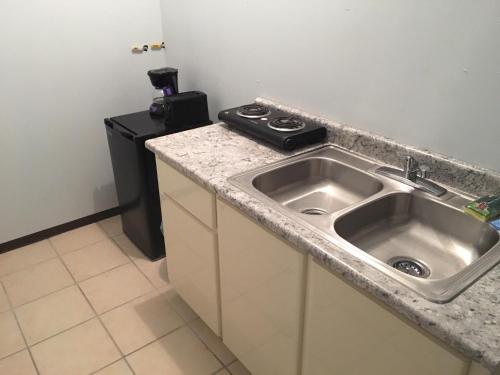 Kuchyň nebo kuchyňský kout v ubytování Rincon Boricua Apartments