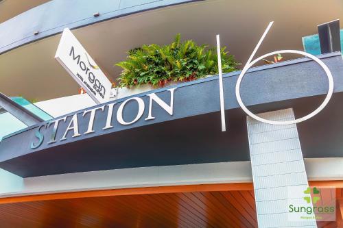 a sign for a station on a building at Morgan Suites in Brisbane