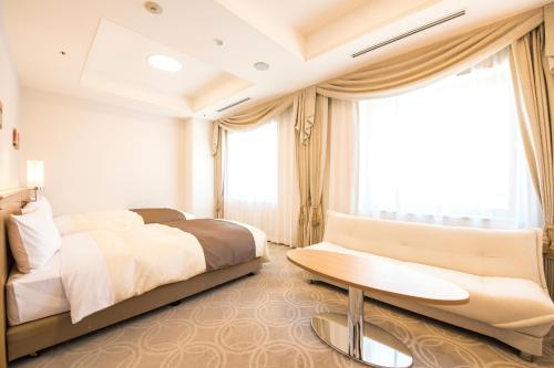 Tempat tidur dalam kamar di Hotel Port Plaza Chiba