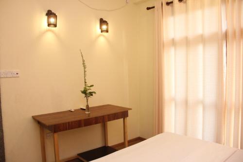 Postel nebo postele na pokoji v ubytování Onilwe Resort Weligama