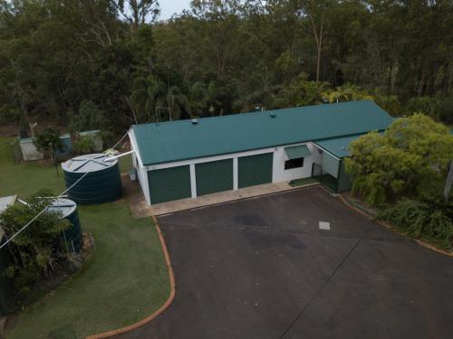 an aerial view of a house with a parking lot at Bungadoo Country Cottage in Bullyard