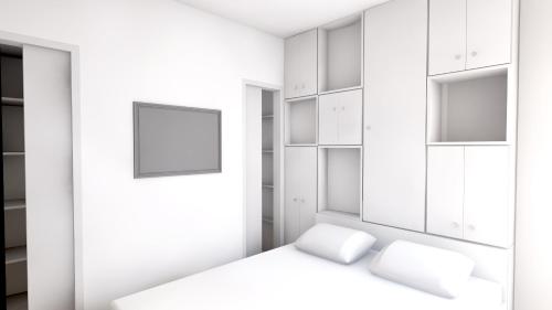Ένα ή περισσότερα κρεβάτια σε δωμάτιο στο XY Suites - Design Apartments