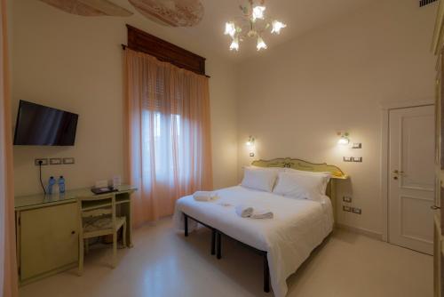 Katil atau katil-katil dalam bilik di Villa Elda Boutique Hotel
