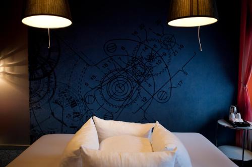 Ένα ή περισσότερα κρεβάτια σε δωμάτιο στο Skotel Amsterdam, Hotelschool The Hague