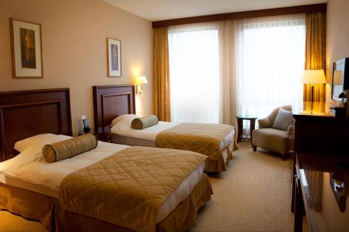Ένα ή περισσότερα κρεβάτια σε δωμάτιο στο Skotel Amsterdam, Hotelschool The Hague