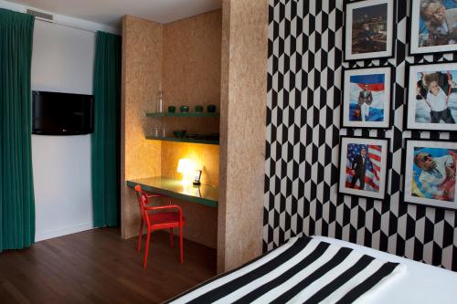 Ένα ή περισσότερα κρεβάτια σε δωμάτιο στο Skotel Amsterdam, Hotelschool The Hague