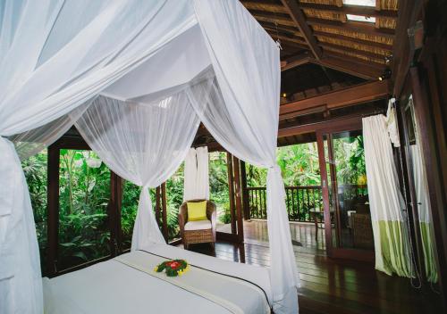 Postel nebo postele na pokoji v ubytování Heaven in Bali