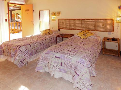Una cama o camas en una habitación de Portal dos Borbas
