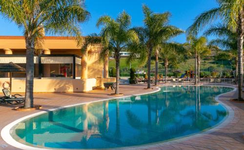 The swimming pool at or close to LuzBay Pool Apartments