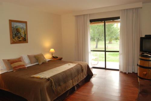 Ένα ή περισσότερα κρεβάτια σε δωμάτιο στο Suter Petit Hotel