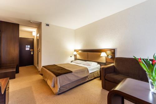 
Łóżko lub łóżka w pokoju w obiekcie Hotel Solny
