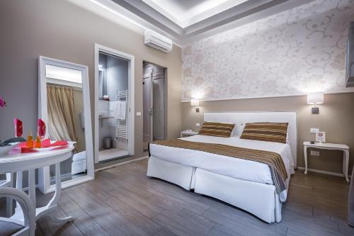 Cama o camas de una habitación en B&B La Residenza Dell'Orafo