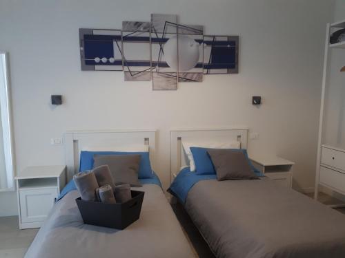 Ένα ή περισσότερα κρεβάτια σε δωμάτιο στο SoleLuna Fiera 6 Rooms