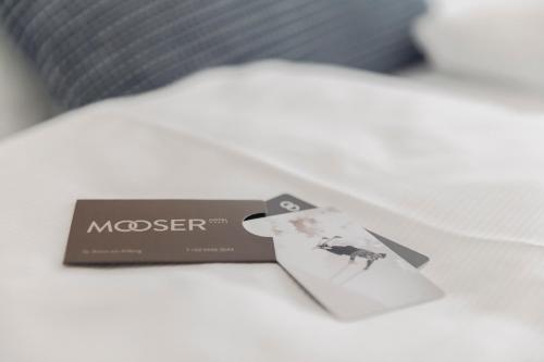 Postel nebo postele na pokoji v ubytování Mooser Hotel