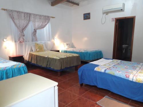 Letto o letti in una camera di Hospedaje Mother Fanny