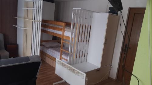 Cama o camas de una habitación en Apartments Vlašić