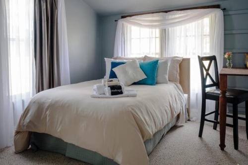 Ένα ή περισσότερα κρεβάτια σε δωμάτιο στο Morgan and Wells Bed and Breakfast