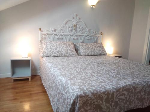 Säng eller sängar i ett rum på Il nido del Picchio 2