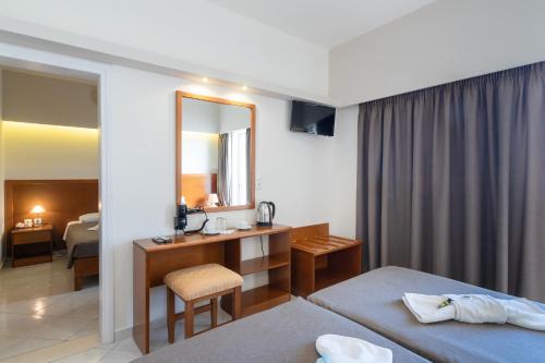 Katil atau katil-katil dalam bilik di Hiona Holiday Hotel