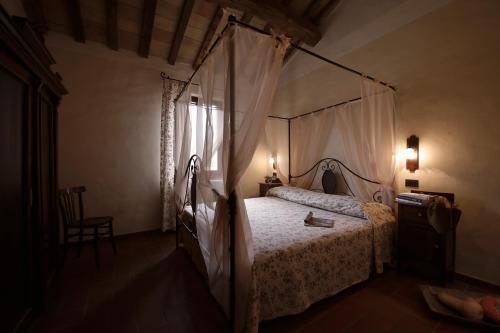 Giường trong phòng chung tại Agriturismo Valpietro