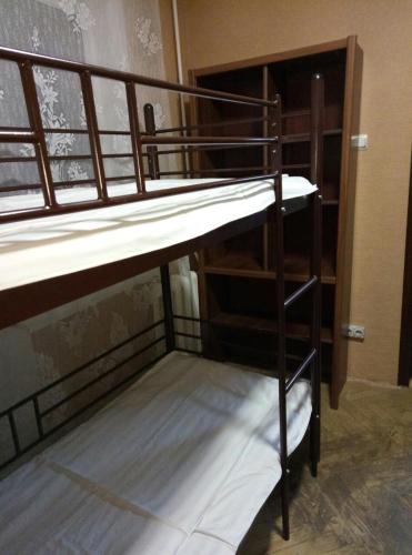 a couple of bunk beds in a room at Hostel "От рассвета до заката" in Kyiv