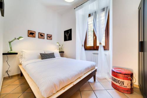 Ένα ή περισσότερα κρεβάτια σε δωμάτιο στο San Lorenzo Home
