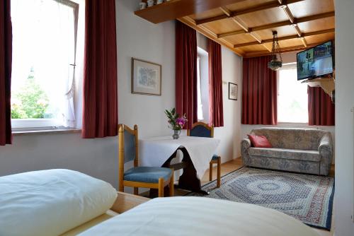 Postel nebo postele na pokoji v ubytování Hotel Bezold
