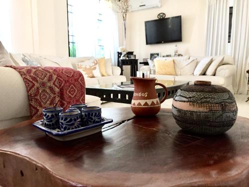 TV a/nebo společenská místnost v ubytování Casa Lara - Habitación cerca del mar - Homestay