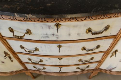 a chest of drawers with animals on it at Casa Rosalía in Ibi