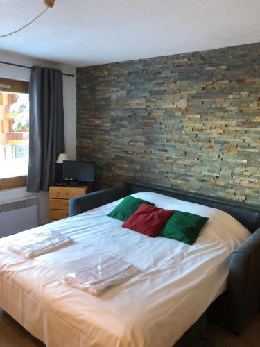 Una cama o camas en una habitación de Cembros 2