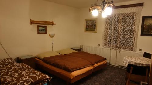 Postel nebo postele na pokoji v ubytování Chalupa u Pichlerů