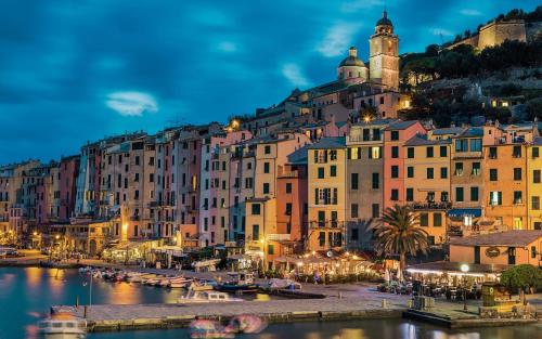 a view of a city with a river and buildings at Cà Marcon in Castelnuovo Magra