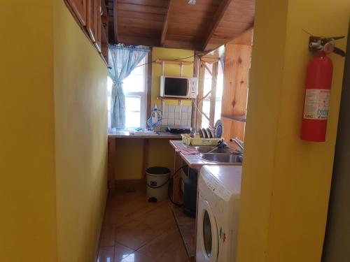 Kuchyň nebo kuchyňský kout v ubytování Coco Mango Suites