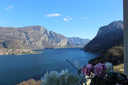 a view of a body of water with mountains at Angolo Paradiso - Lago di Como in Valbrona