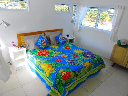 Postel nebo postele na pokoji v ubytování Moana Oasis Villa - Rarotonga