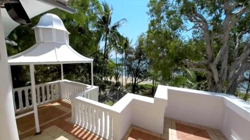 a white porch with a gazebo on a house at Sarayi Boutique Hotel in Palm Cove