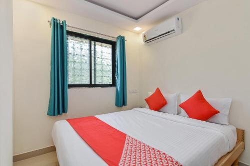 Postel nebo postele na pokoji v ubytování Hotel Devi Residency