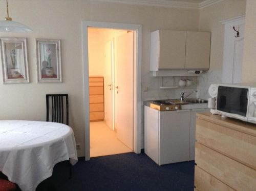 Kuchyň nebo kuchyňský kout v ubytování Appartements Basti