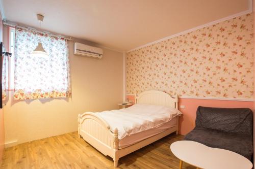 Postel nebo postele na pokoji v ubytování N. Castle Hotel