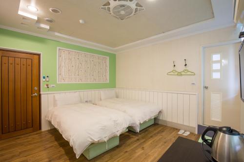 Postel nebo postele na pokoji v ubytování N. Castle Hotel